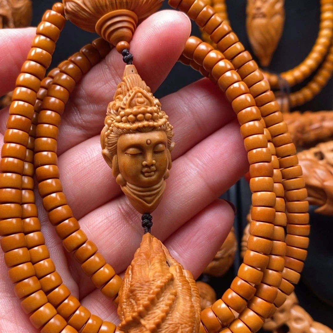 橄榄核手串观音脖挂