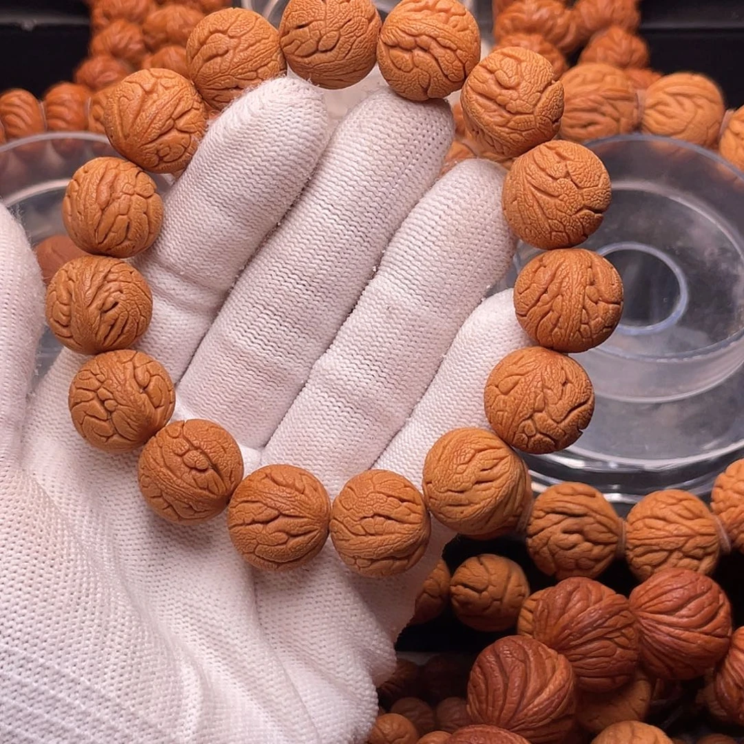 手串桃核金丝龙珠1.7