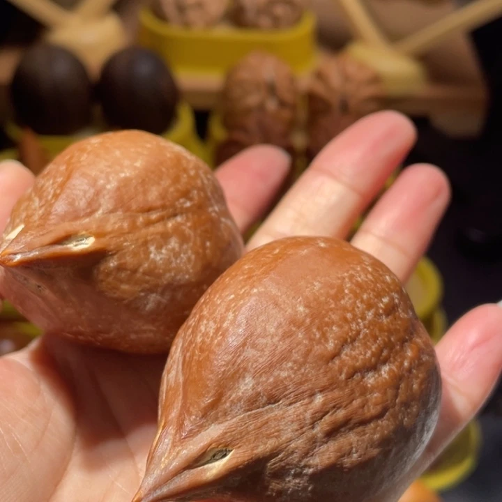 沐***橙文玩核桃吊坠橄榄核大尺180