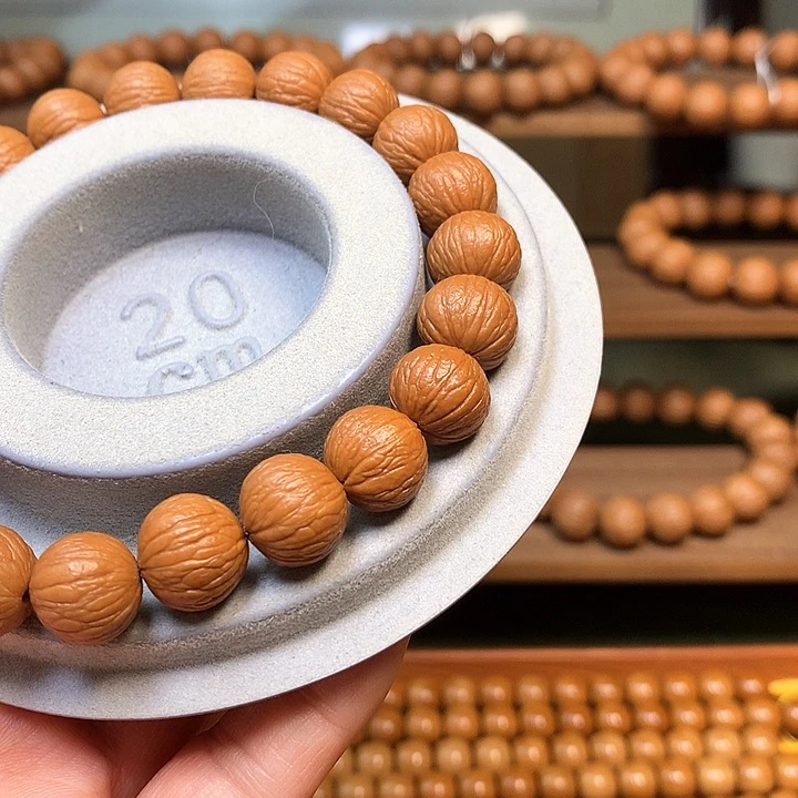 核桃豪**连12同尺凤羽手串全品