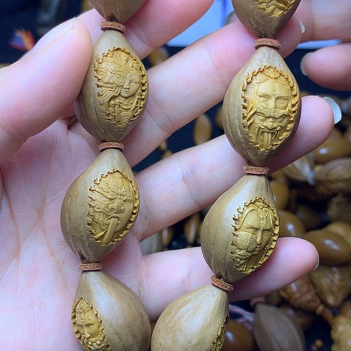 橄榄核雕刻手串扎基拉姆