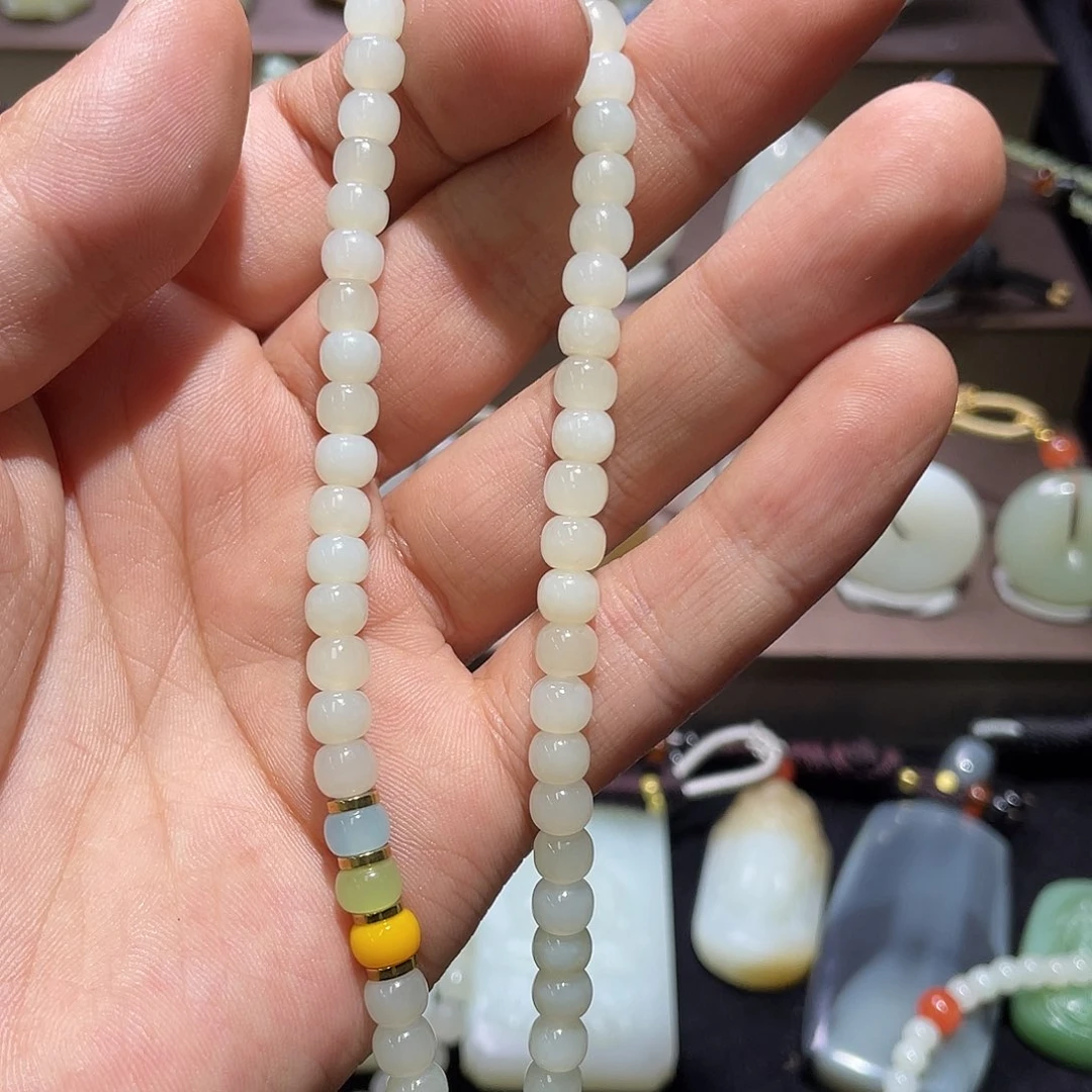 和田玉挂件18K金镶嵌