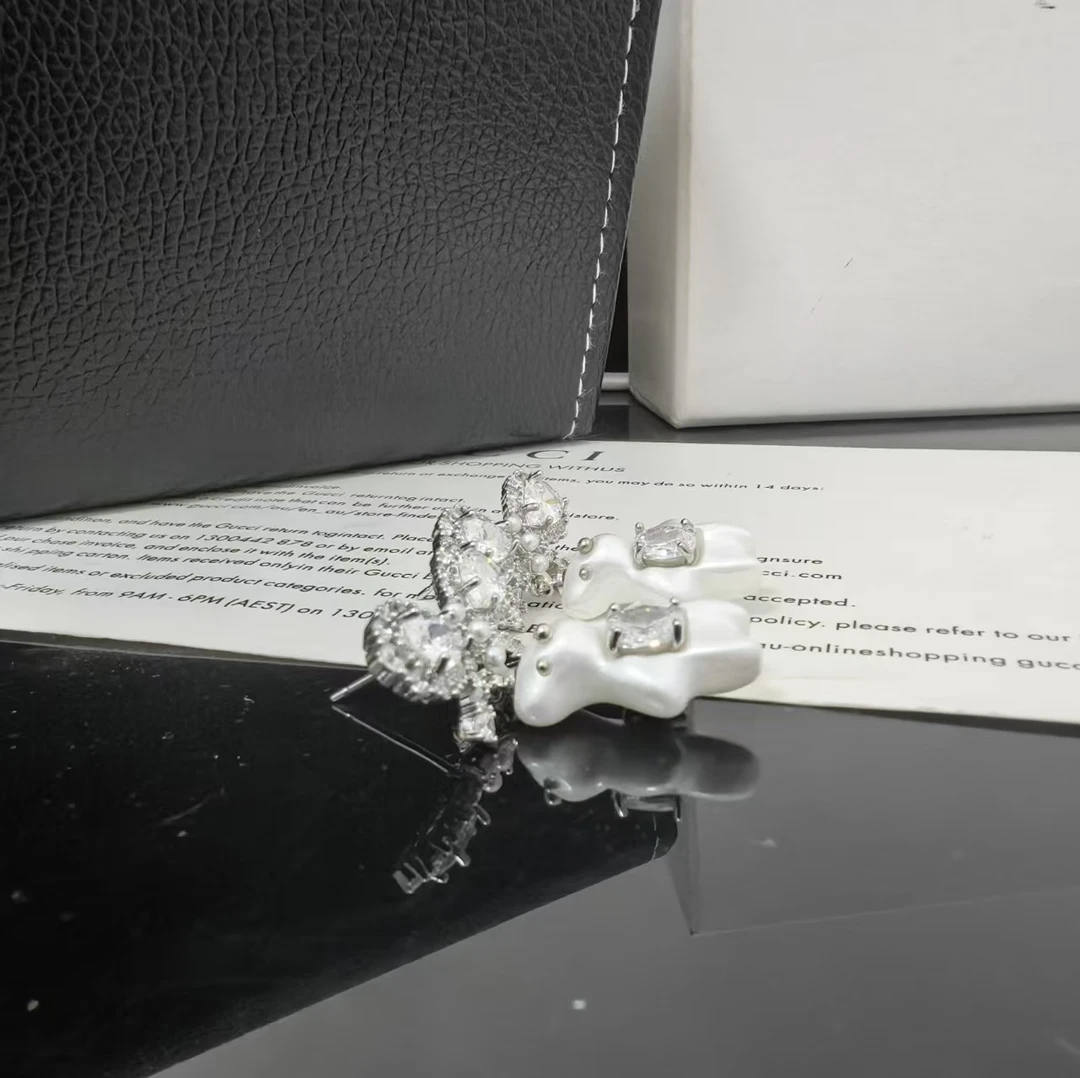 黄铜合成锆石耳饰 白色小熊满锆蝴蝶结耳钉