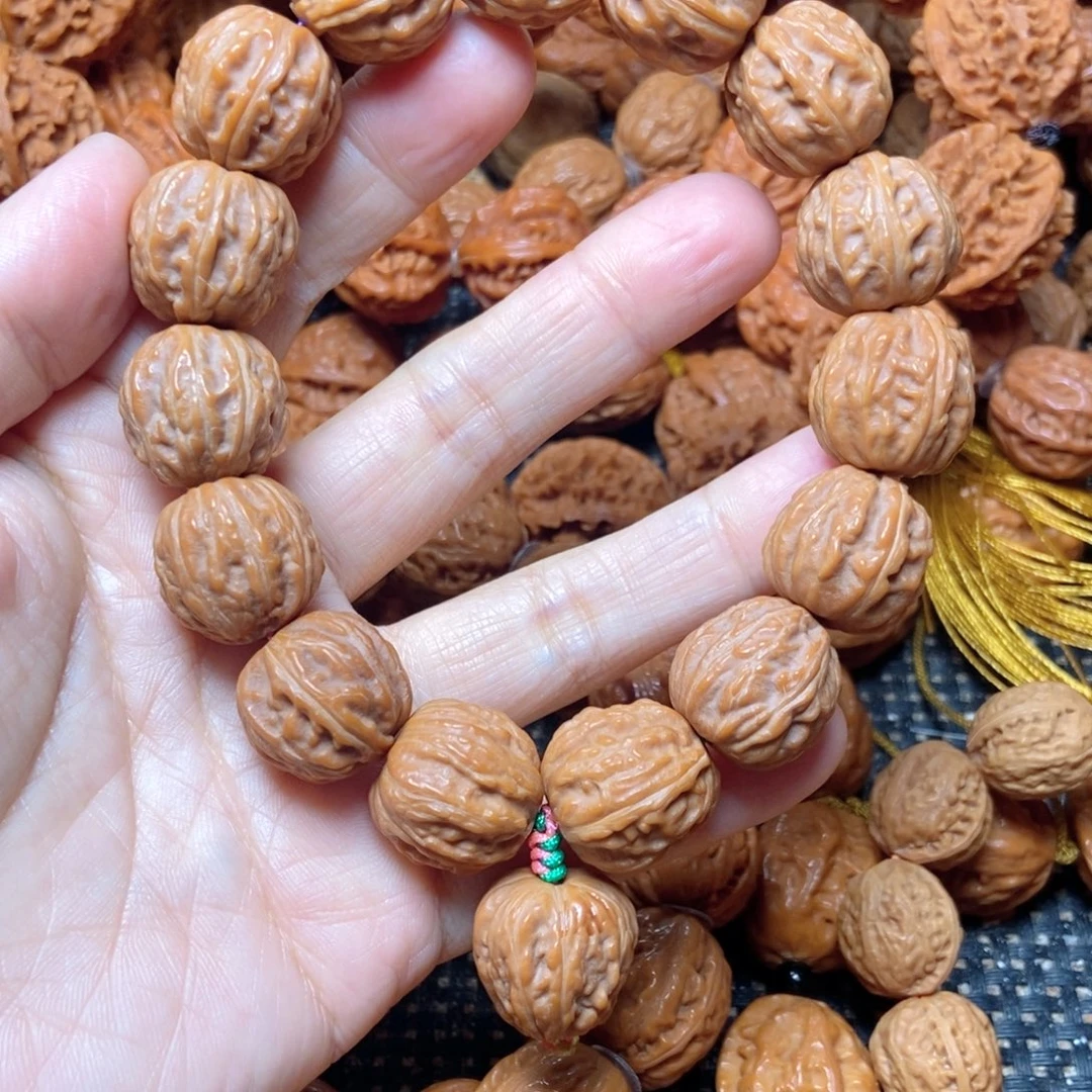 胡***北吊坠桃核树王八棱手串