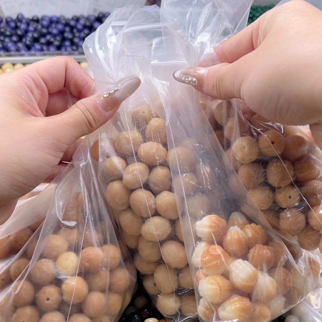 白玉菩提吊坠q16-18mm10+2颗。四拼