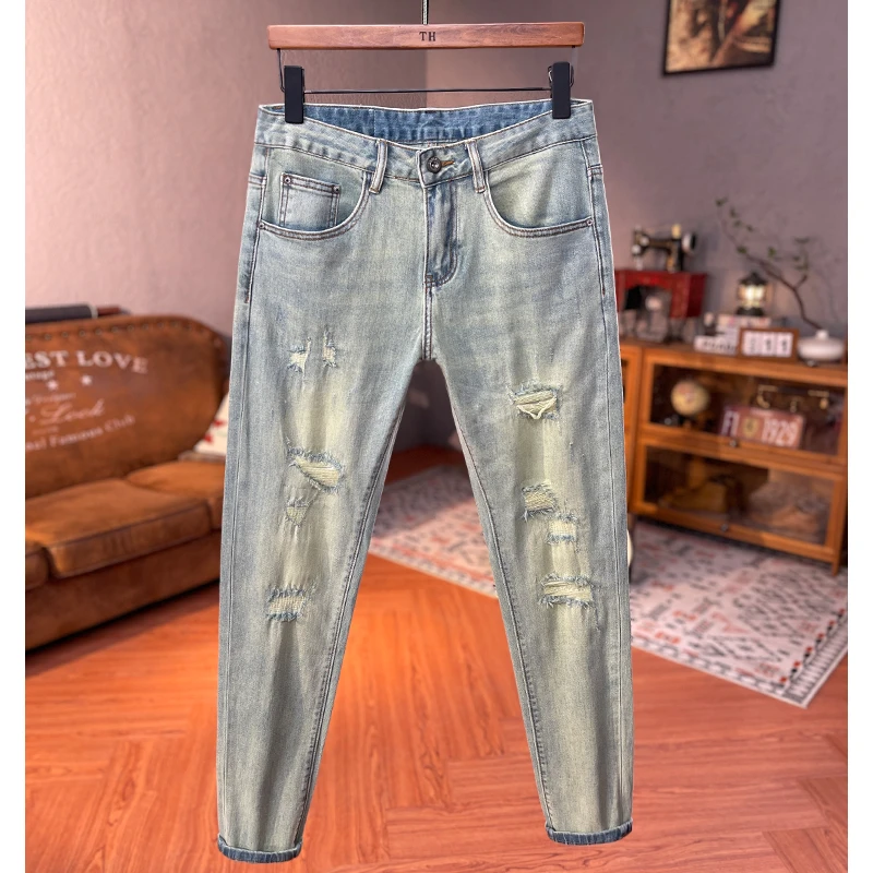 高端复古水洗男士九分牛仔裤夏季新款个性破洞补丁修身小脚长裤潮