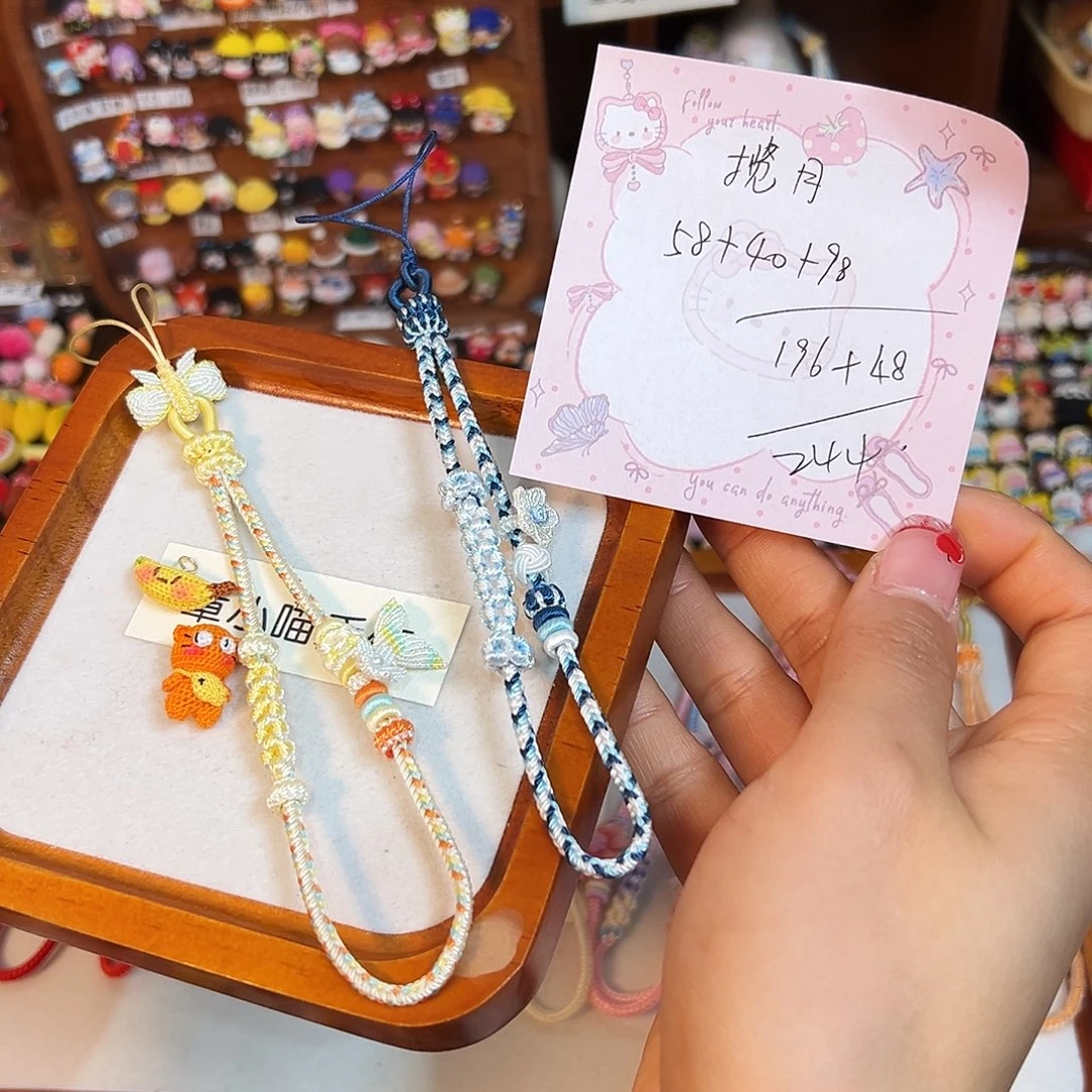 揽***色针织品手工钩织玩偶手机绳