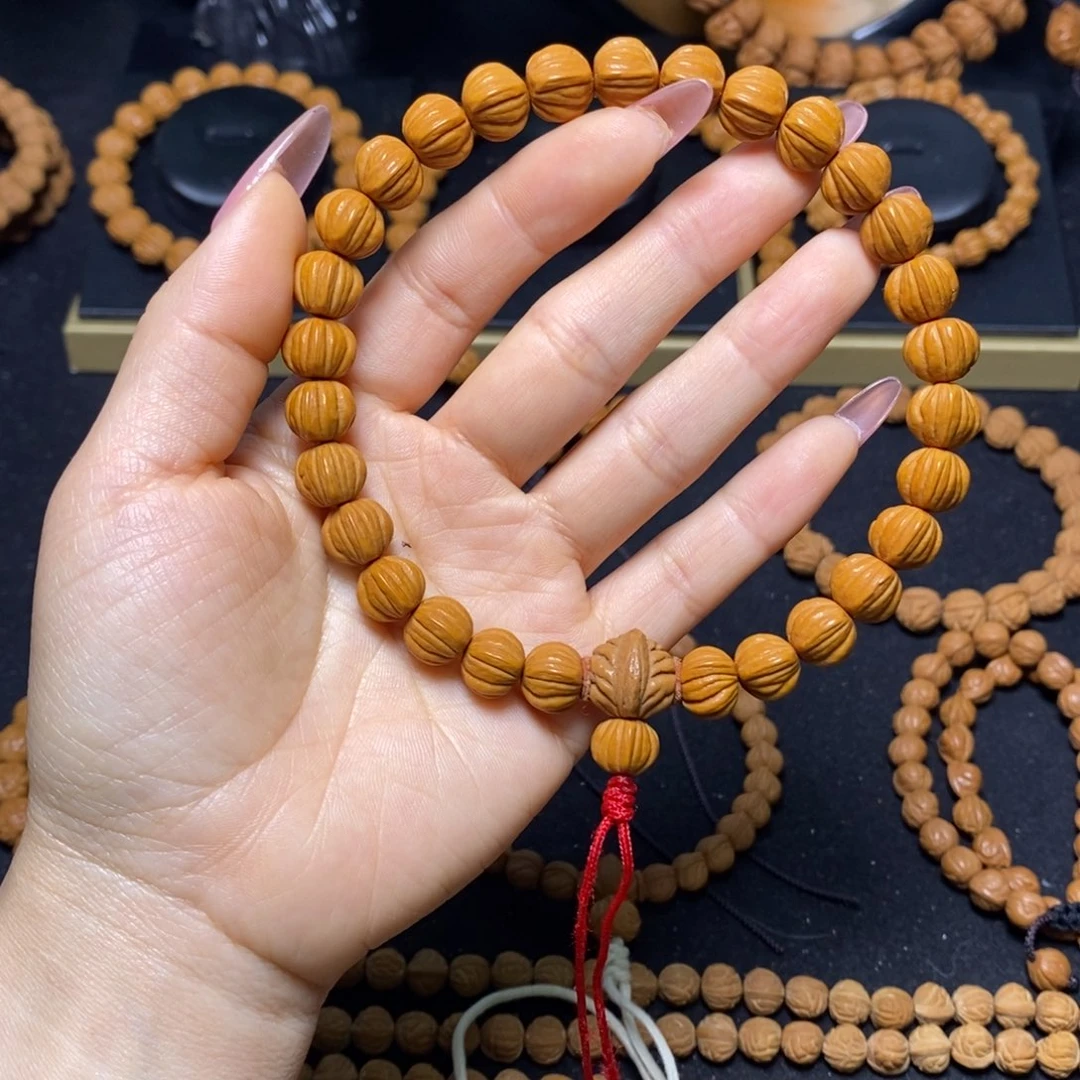 M***u桃核吊坠秦岭文玩