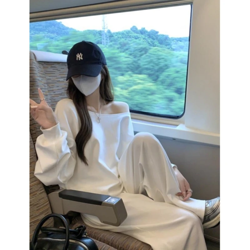 韩系chic慵懒松弛感白色斜领上衣女早秋季爆款一字肩套头无帽卫衣