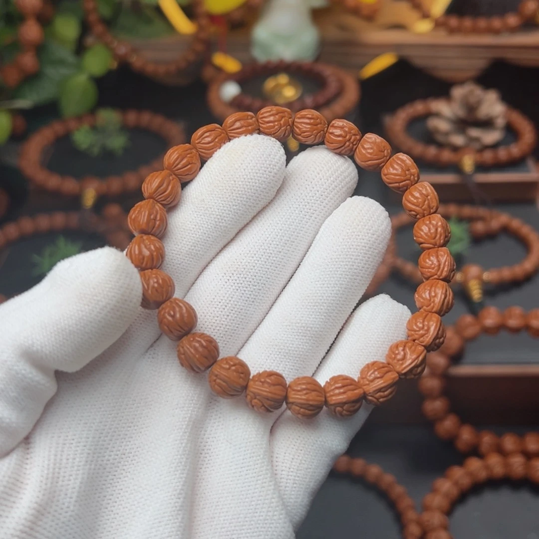 吊坠桃核一***?1.0双脊龙手串