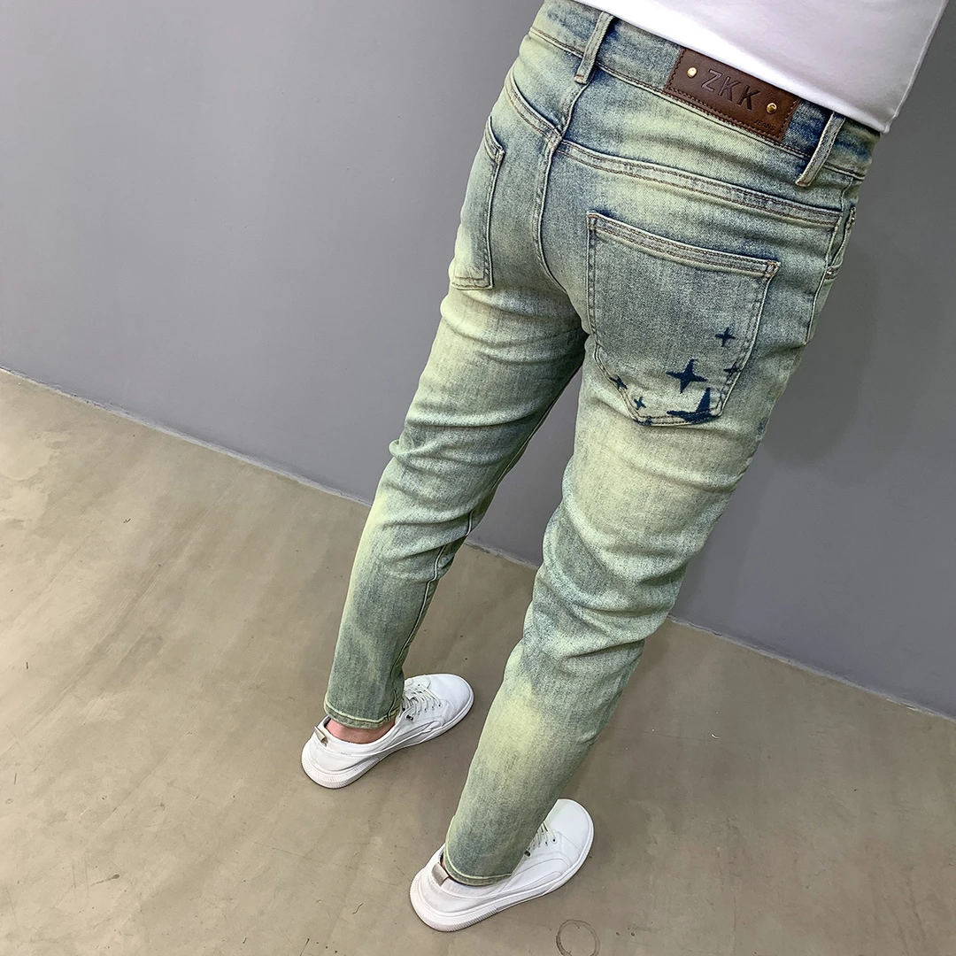 时尚刺绣牛仔裤男士潮流做旧蓝色百搭修身弹力秋季韩版小脚长裤