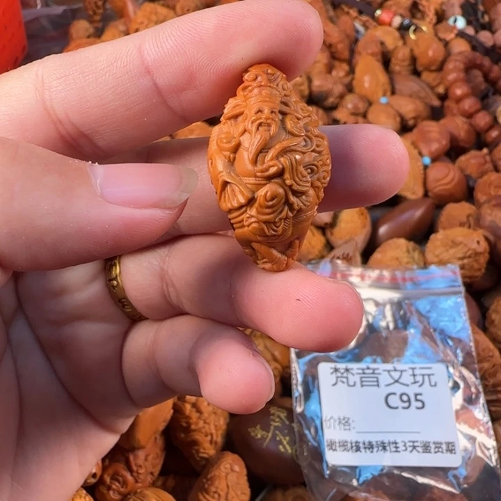 吊坠橄榄核C95骑象财神
