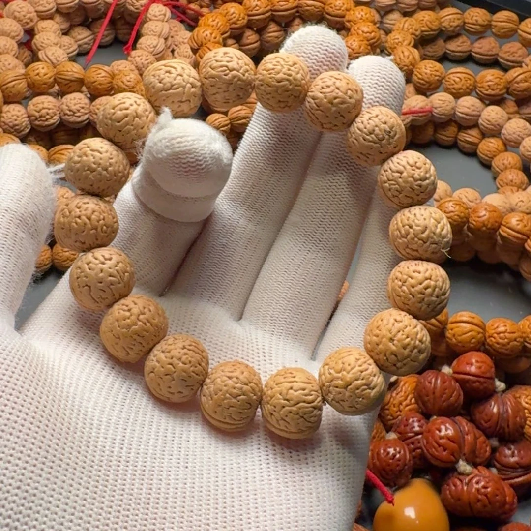倪***柔桃核手串盘锦密纹手串白茬