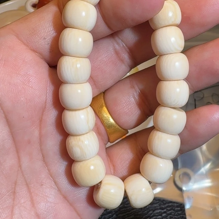 锅***又吊坠菩提根/象牙果