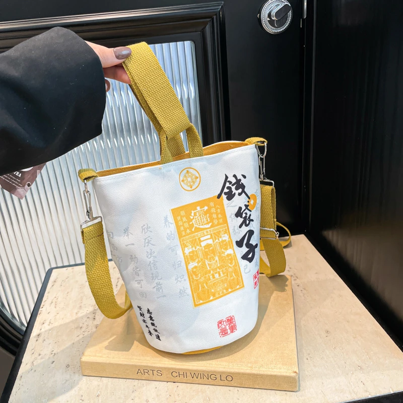 灵隐钱袋子水桶帆布包 单肩手提包休闲旅行布袋包