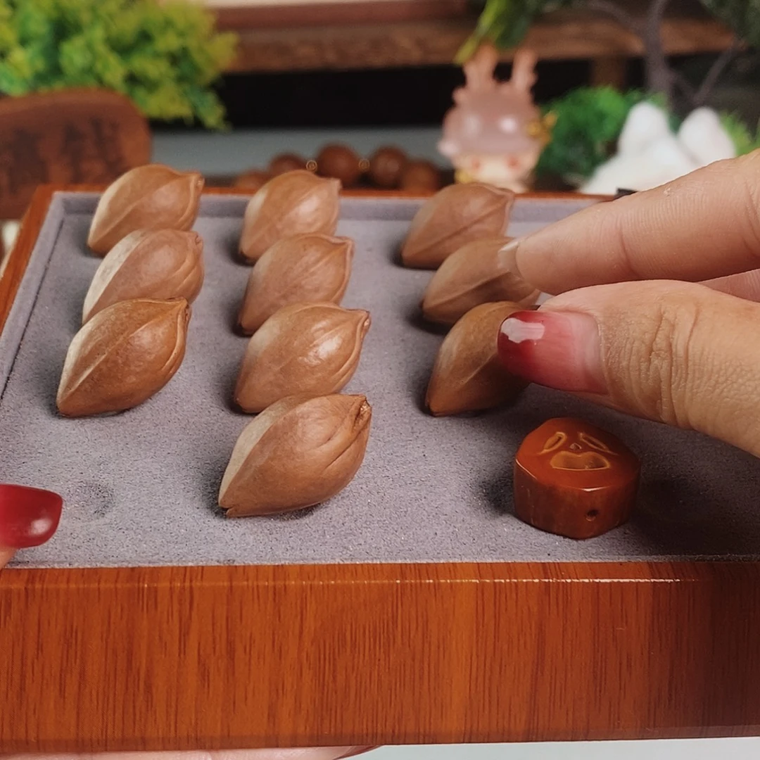 十***丞手串橄榄核15/25三面佛抛光不退不换