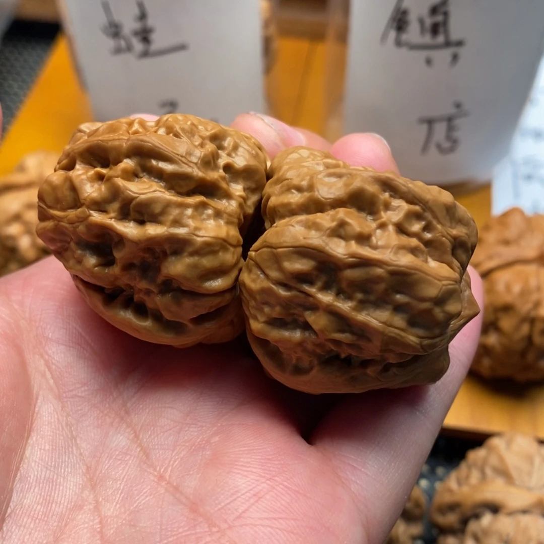 小***-文玩核桃把件边35左右