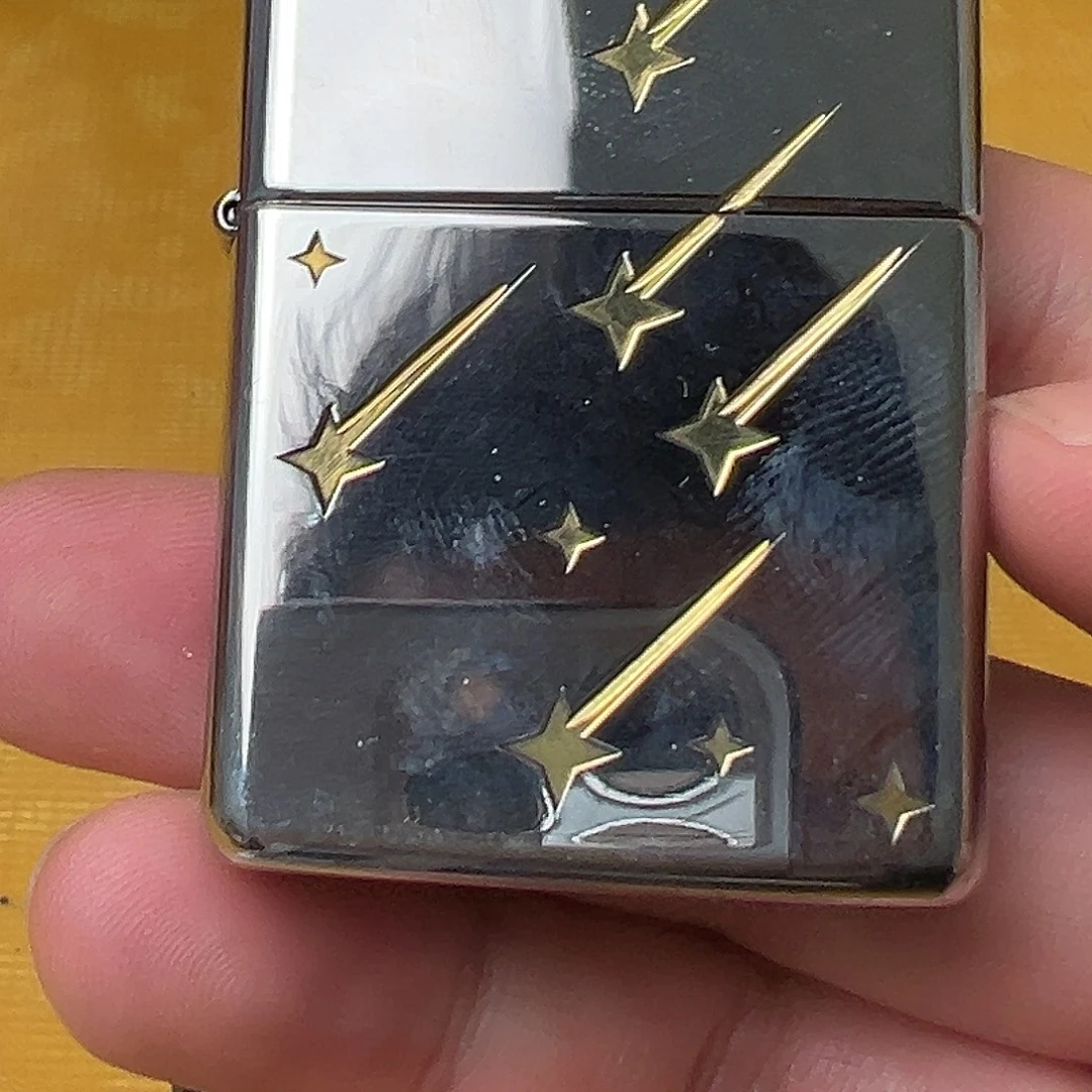 铜盔甲的流星雨打火机全新的那个