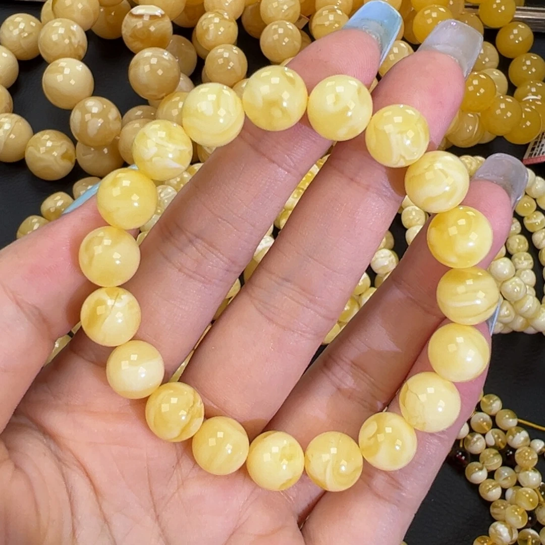 琥珀未镶嵌手链11.4黄白妖花