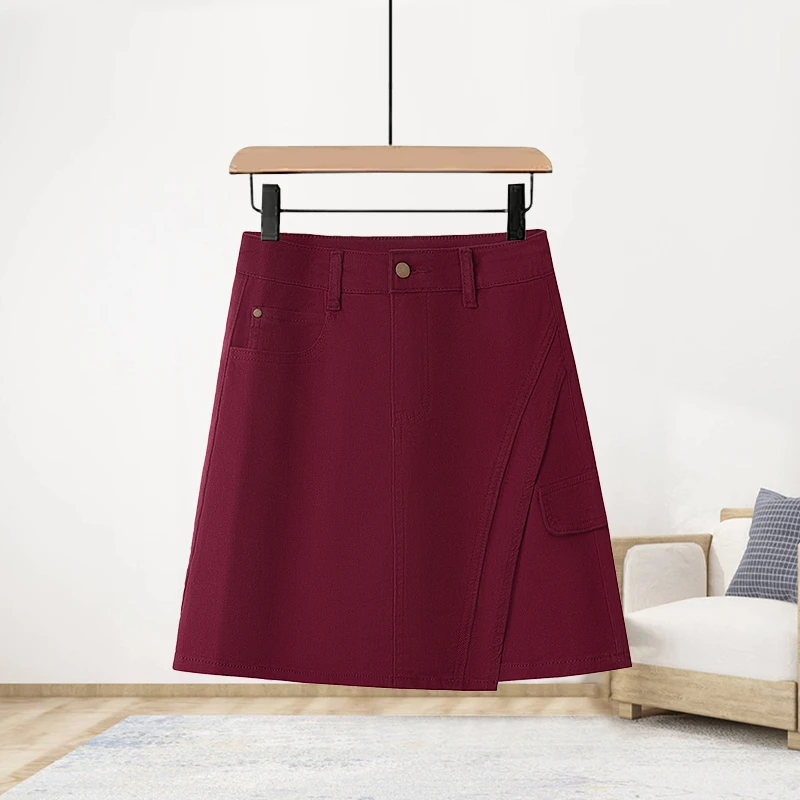 2025早秋冬季酒红色不规则牛仔短裙女高腰修身显瘦a字包臀半身裙