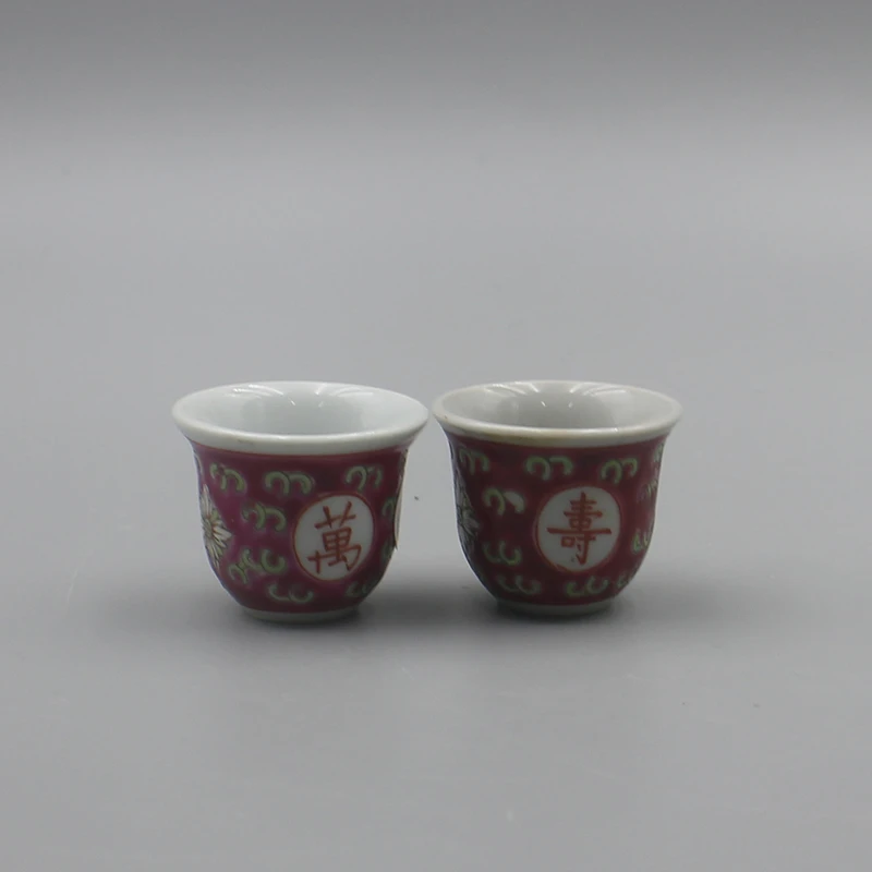 12401瓷器--胭脂红地粉彩万寿杯一对