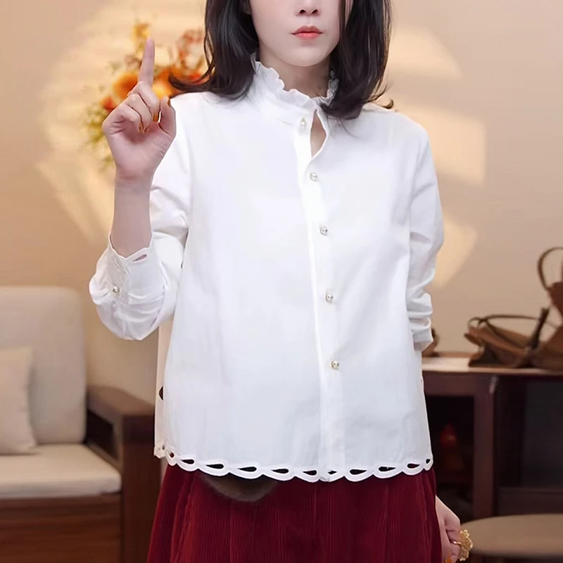 白色立领衬衫女2025秋冬新款高级感宽松显瘦复古花边镂空打底上衣