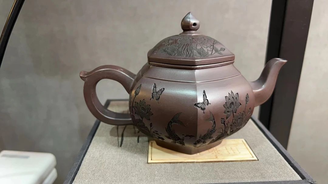 宜兴市DT1284鱼趣六方笑樱紫龙血砂（壶内速干）紫砂壶