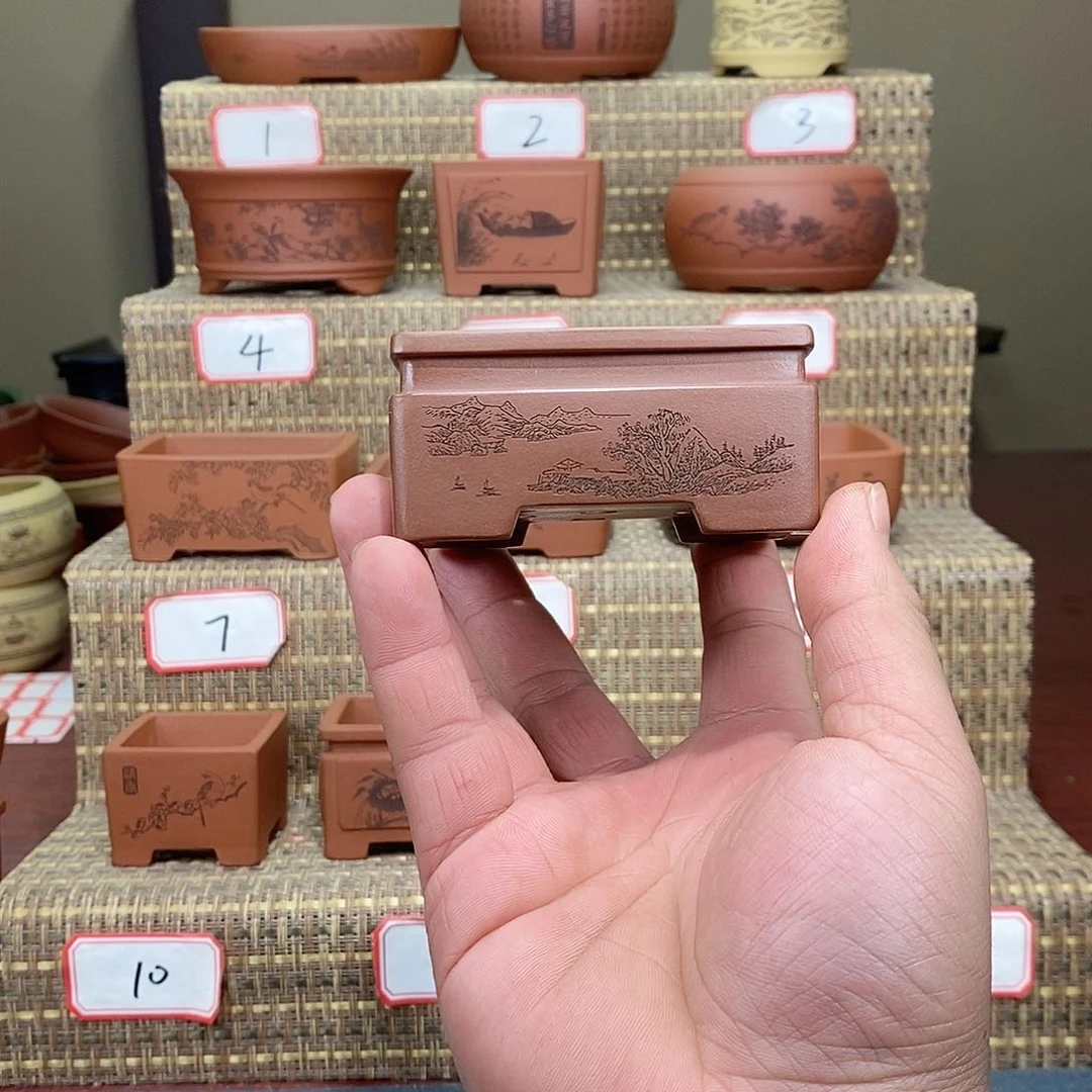 紫砂花盆じ****?你的手机