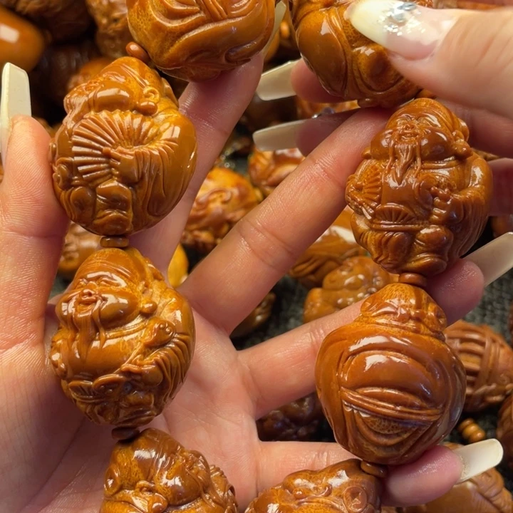 橄榄核吊坠大财神手持