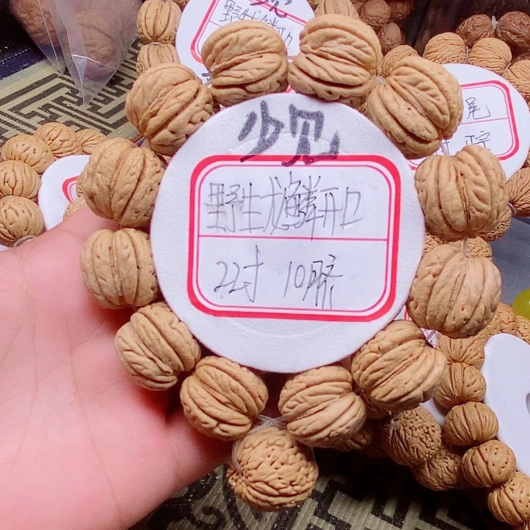 桃核手串郑*野生龙鳞开口22