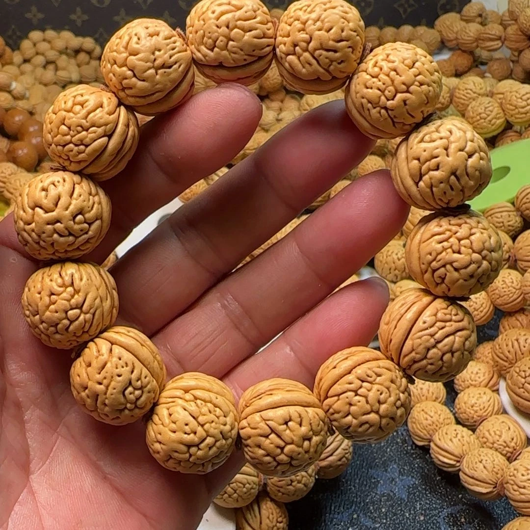 大***飞桃核吊坠盘锦肌肉