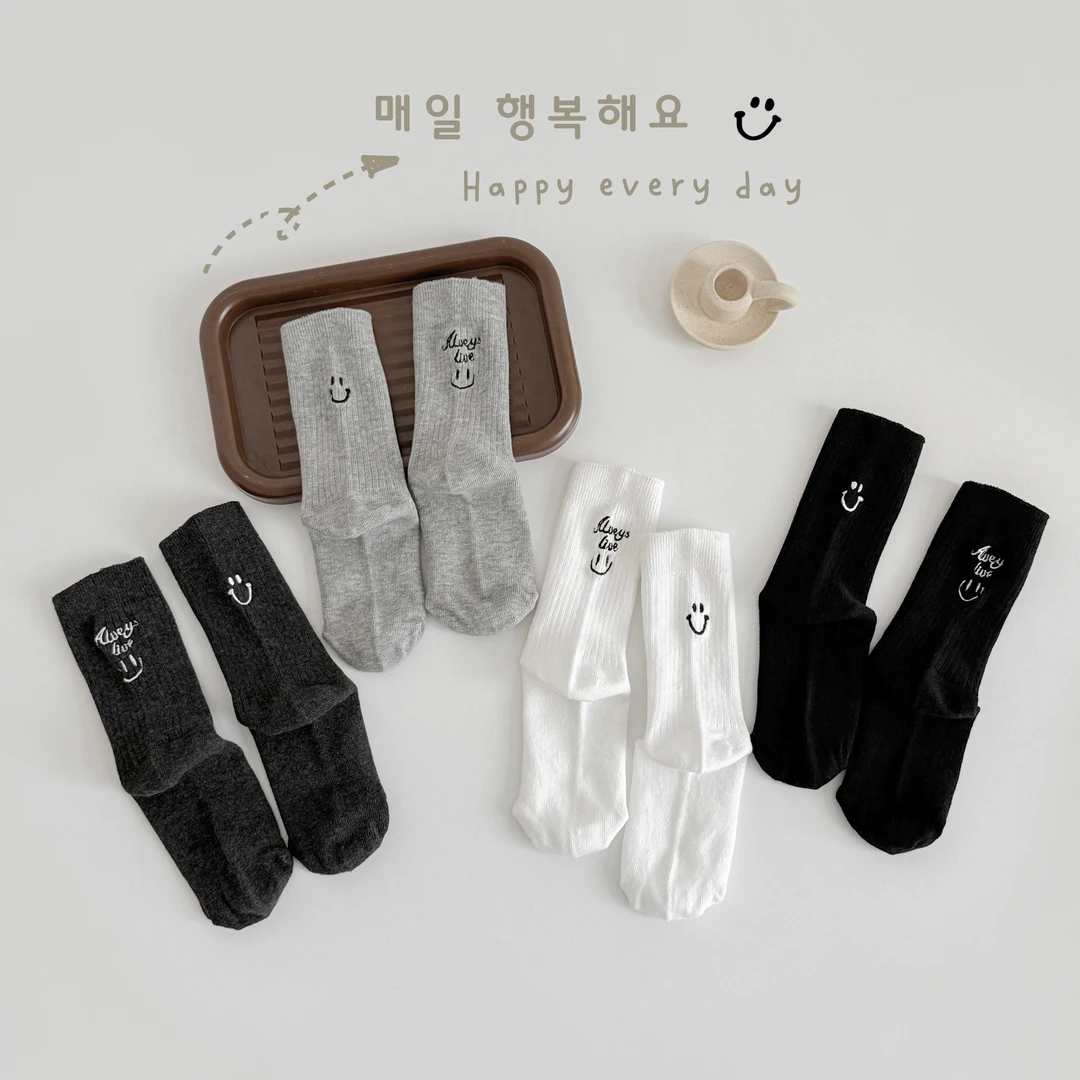 女童袜子春秋季双针刺绣笑脸纯色黑白灰小女孩韩系百搭中筒棉袜冬