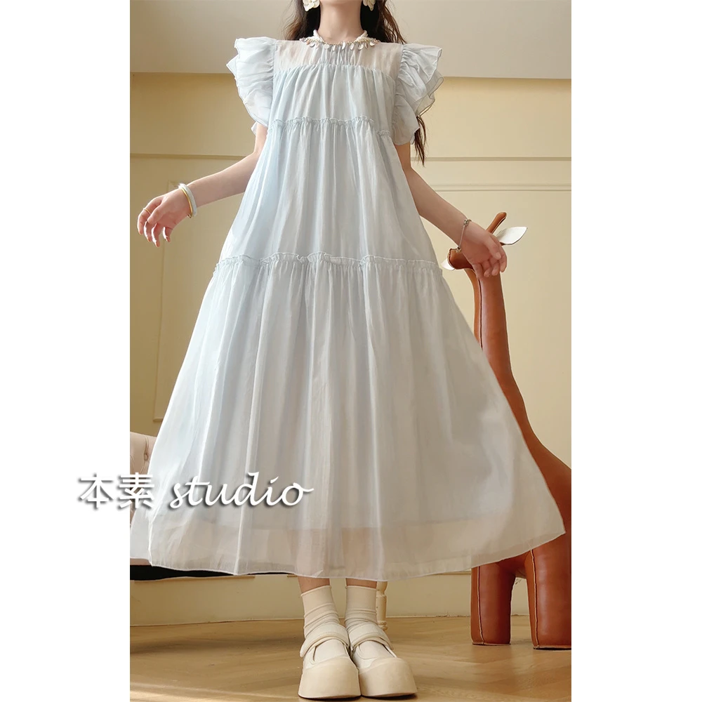 海边轻舞C4082流苏木耳边圆领飞飞袖短款连衣裙