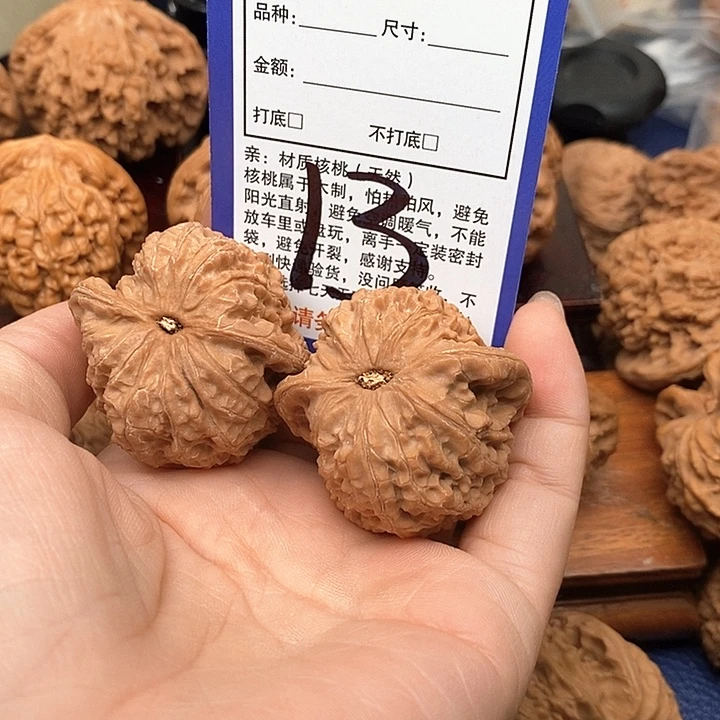 简***单桃核吊坠血麒麟狮子头40