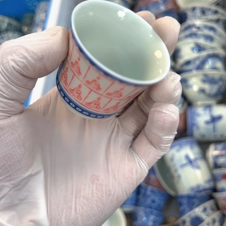 瓷片白青花泛红千佛马蹄客杯