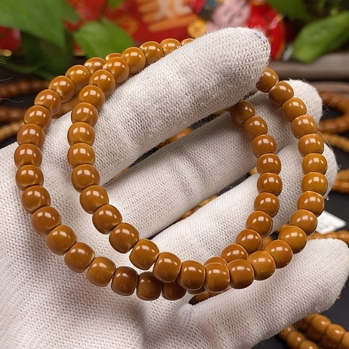 橄榄核手串6.8老挝核尖正三单圈微白