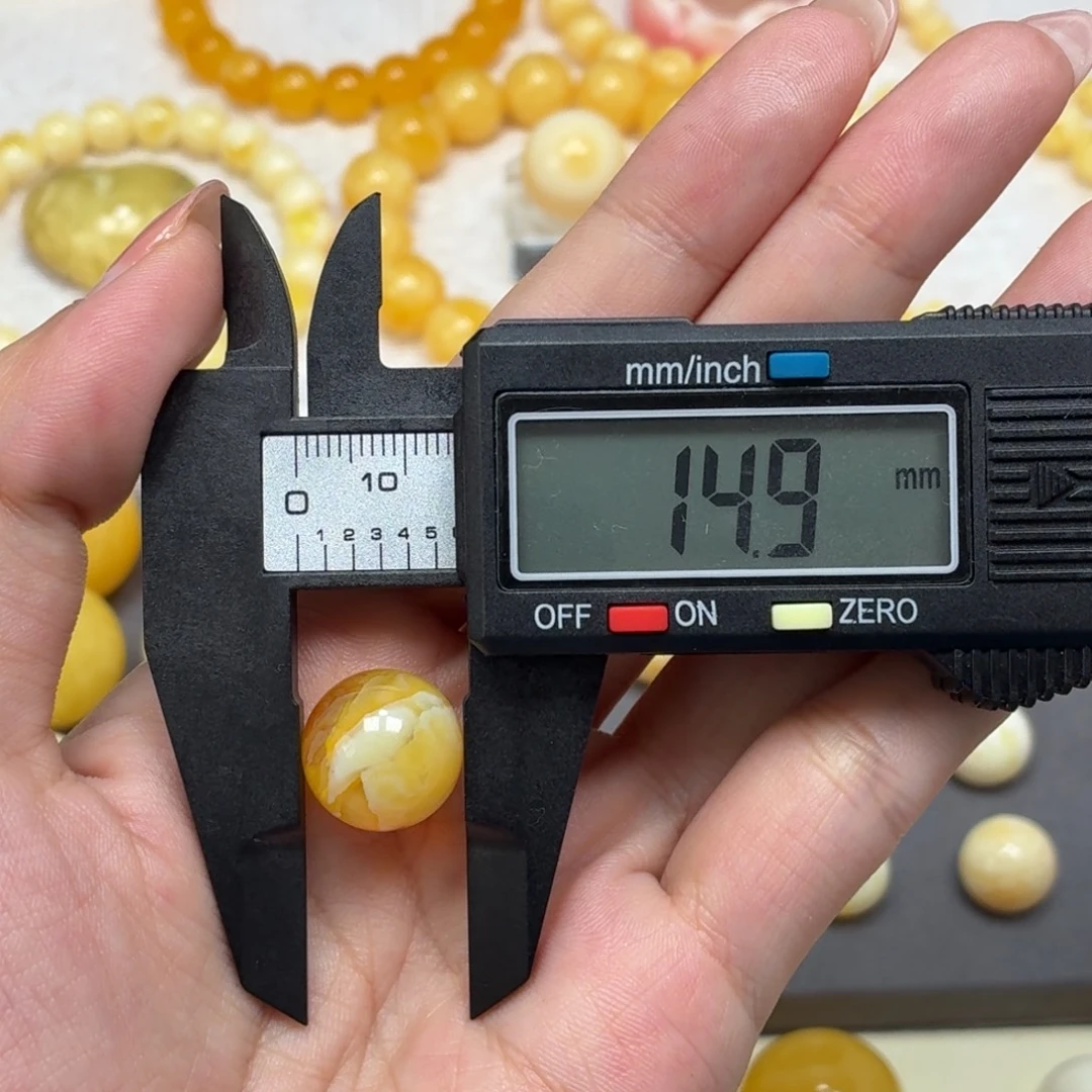 琥珀未镶嵌颈饰焦皮金橘白溶洞荧光单珠14.9mm