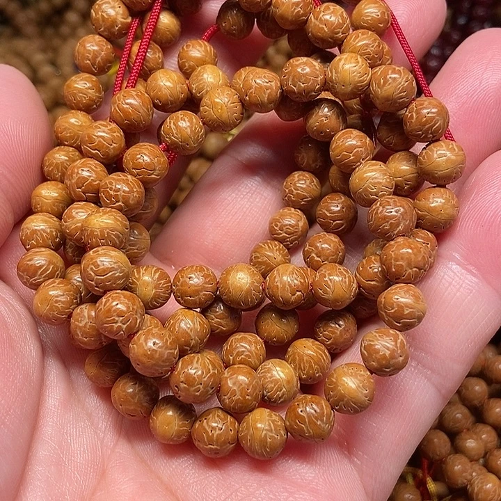 那***谁凤眼菩提吊坠酸枣核