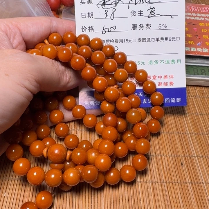 左***眼吊坠橄榄核手链是