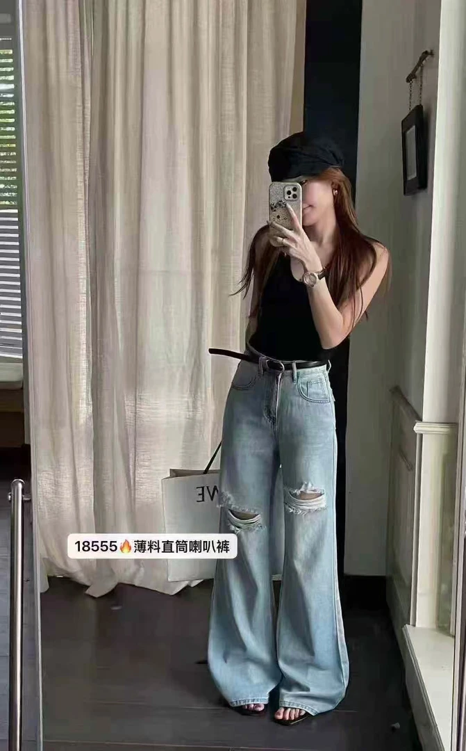 杨茹家气质款破洞牛仔喇叭裤18555