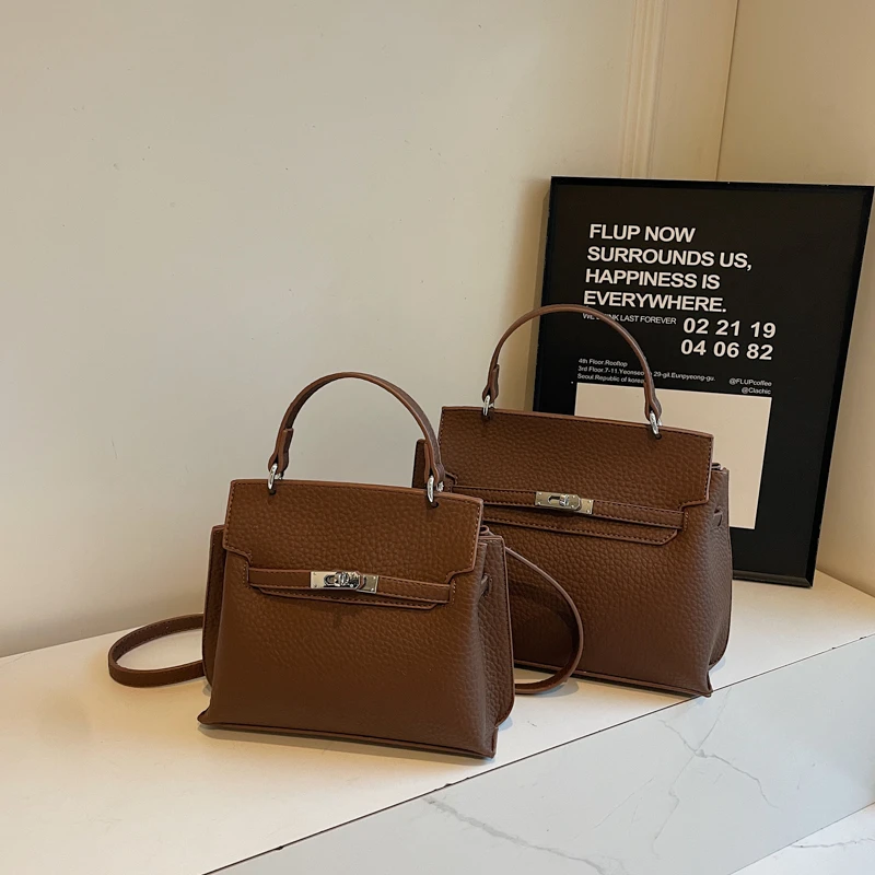 小众设计高级感手提凯莉包2025新款软皮荔枝纹通勤包斜挎包女