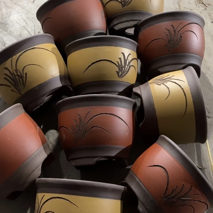 紫砂花盆100-10。   15-12