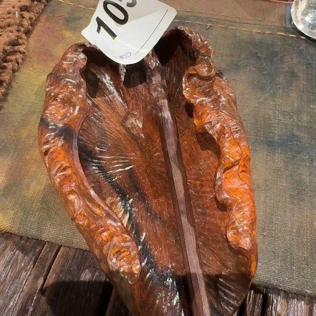 向**长茶则加茶拨茶则。木头