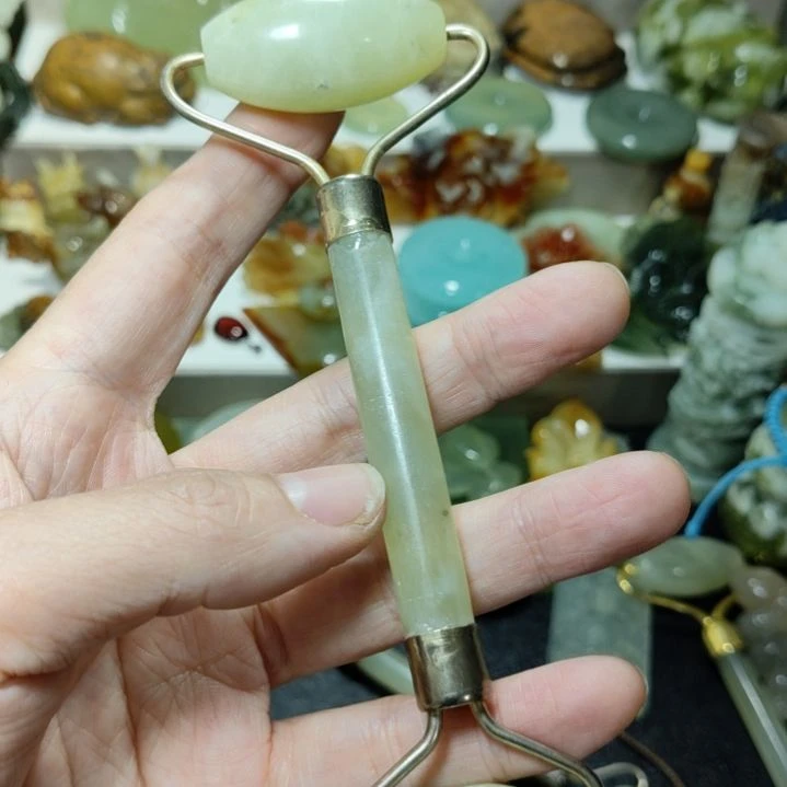 岫玉玉手把件未镶嵌红**梦