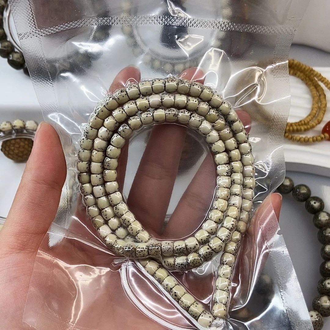 T***e手串星月菩提卡6灰背河豚108m72