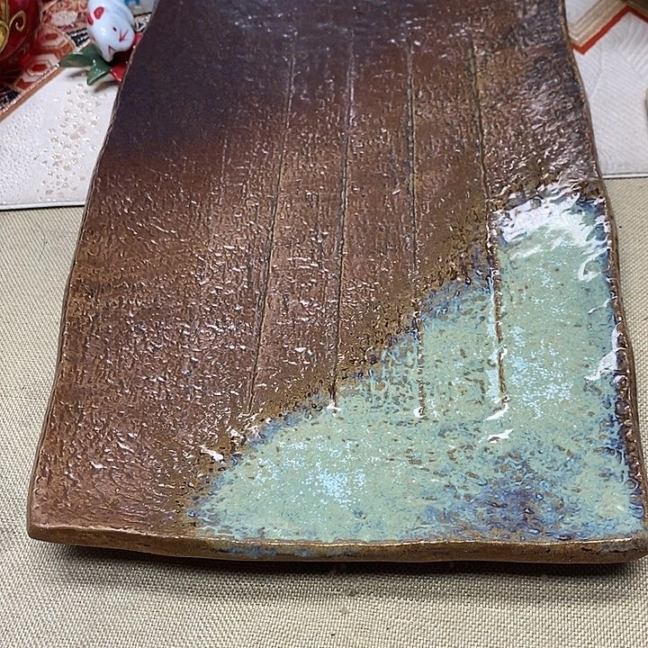 茶壶紫砂杯子的味道就好像被风雨所覆盖一般不