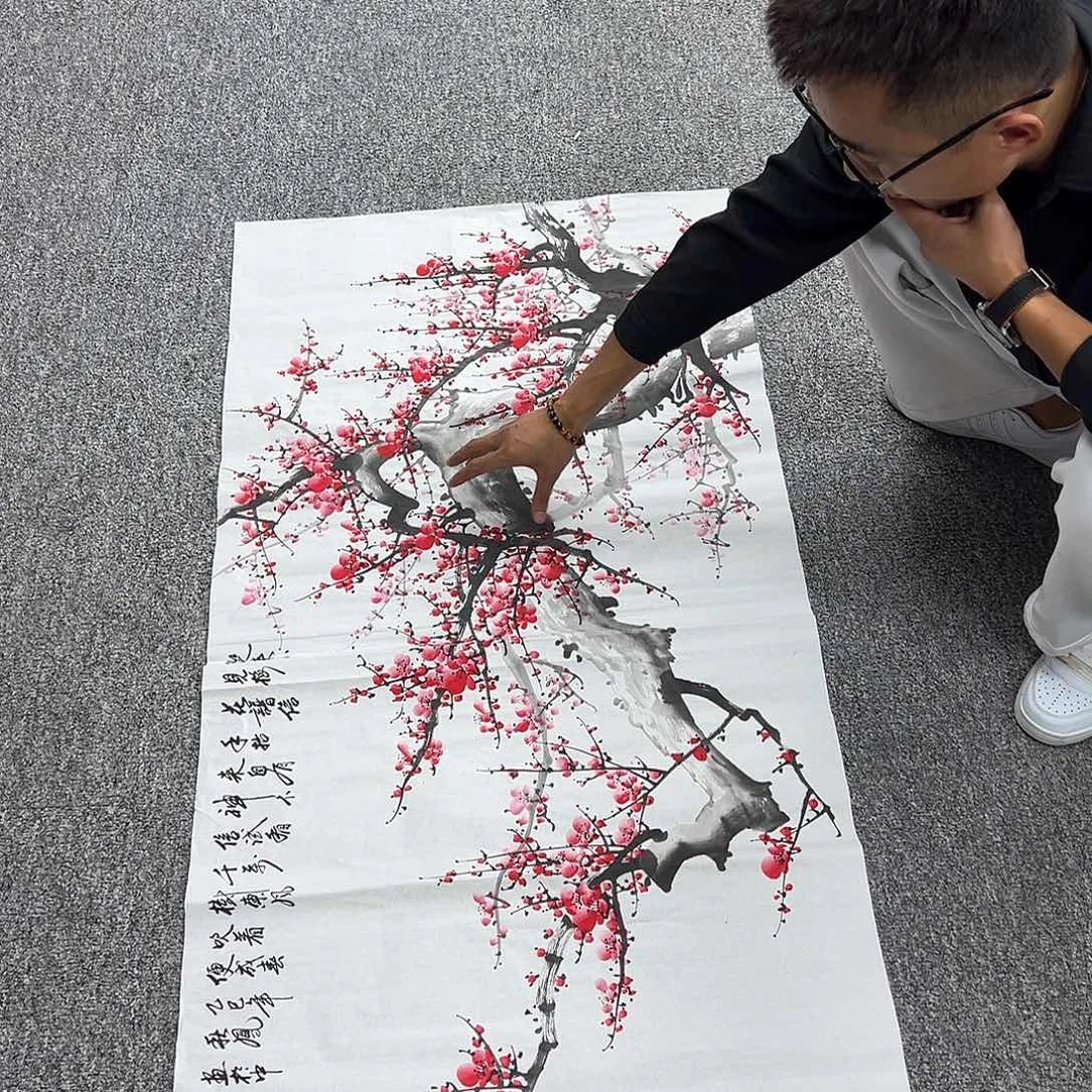 国画卖字画的小男孩
