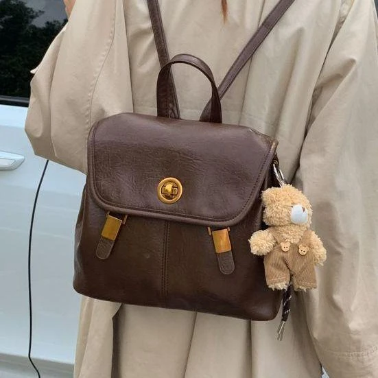 新疆包邮乌市发货复古学院风女士双肩包2025新款高级感百搭手拎包