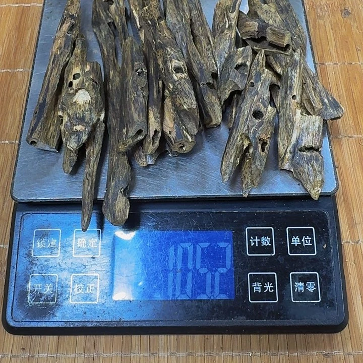 沉香木手把件杨****.海南陆河品种块料