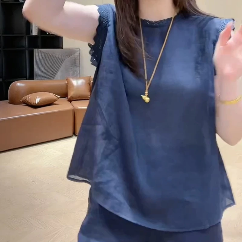 夏季时尚蕾丝花边镂空薄款宽松上衣纯色背心LK2505060